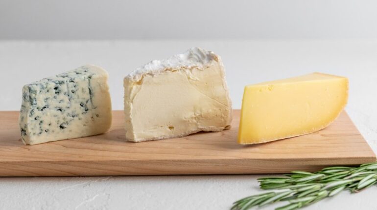 3 Cheese Wedges on a Cheese Board Platter
