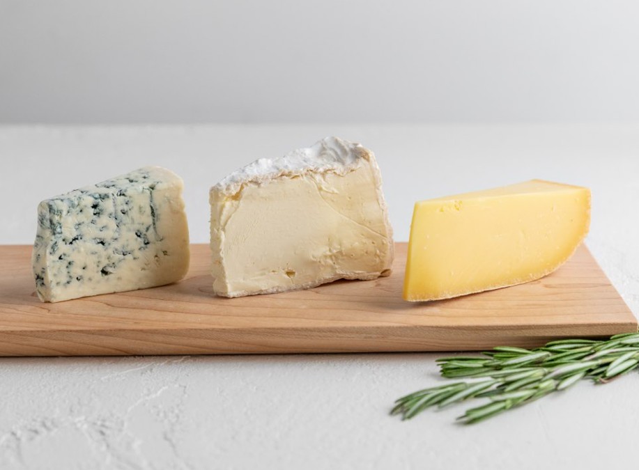 3 Cheese Wedges on a Cheese Board Platter