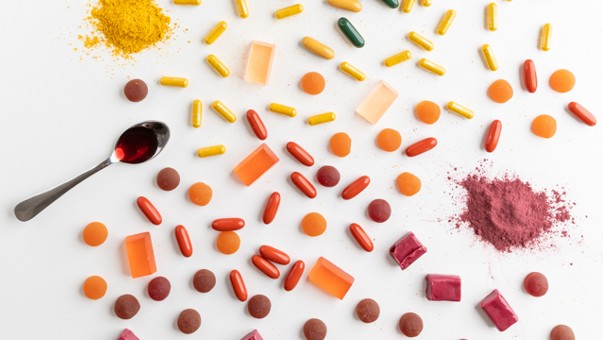 Bright Colorful Supplements on a White Background