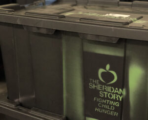 A Container of Food Headed for The Sheridan Story Food Shelf