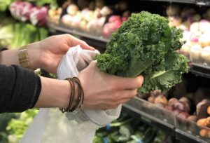 Selecting Kale in Produce