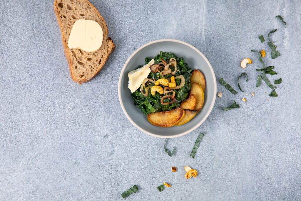 Image for Warm Kale Salad with Apples and Curried Cashews