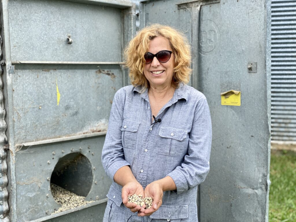 Noreen of Doubting Thomas Holds Blue Corn