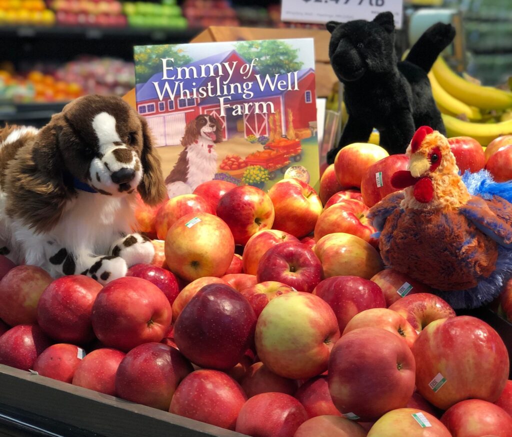 https://www.lakewinds.coop/wp-content/uploads/2021/08/Whistling-Well-Farm-Apples-with-Stuffed-Animals-and-Book-square-scaled-e1631204298462-1024x873.jpg