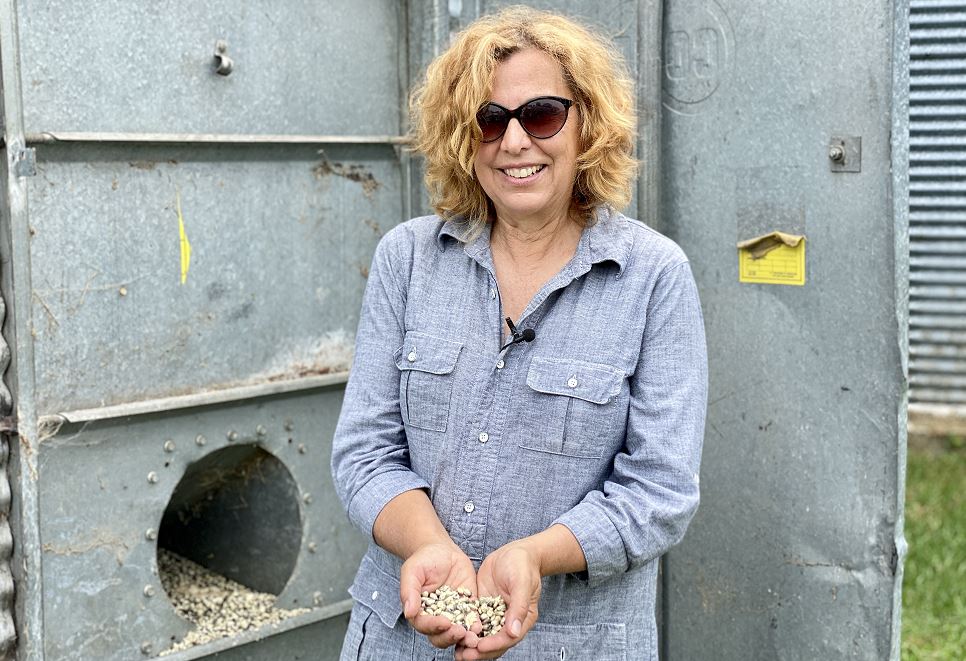 Local Organic Farmer Noreen Holds Blue Corn