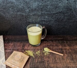 Matcha in Mug on Wood Table