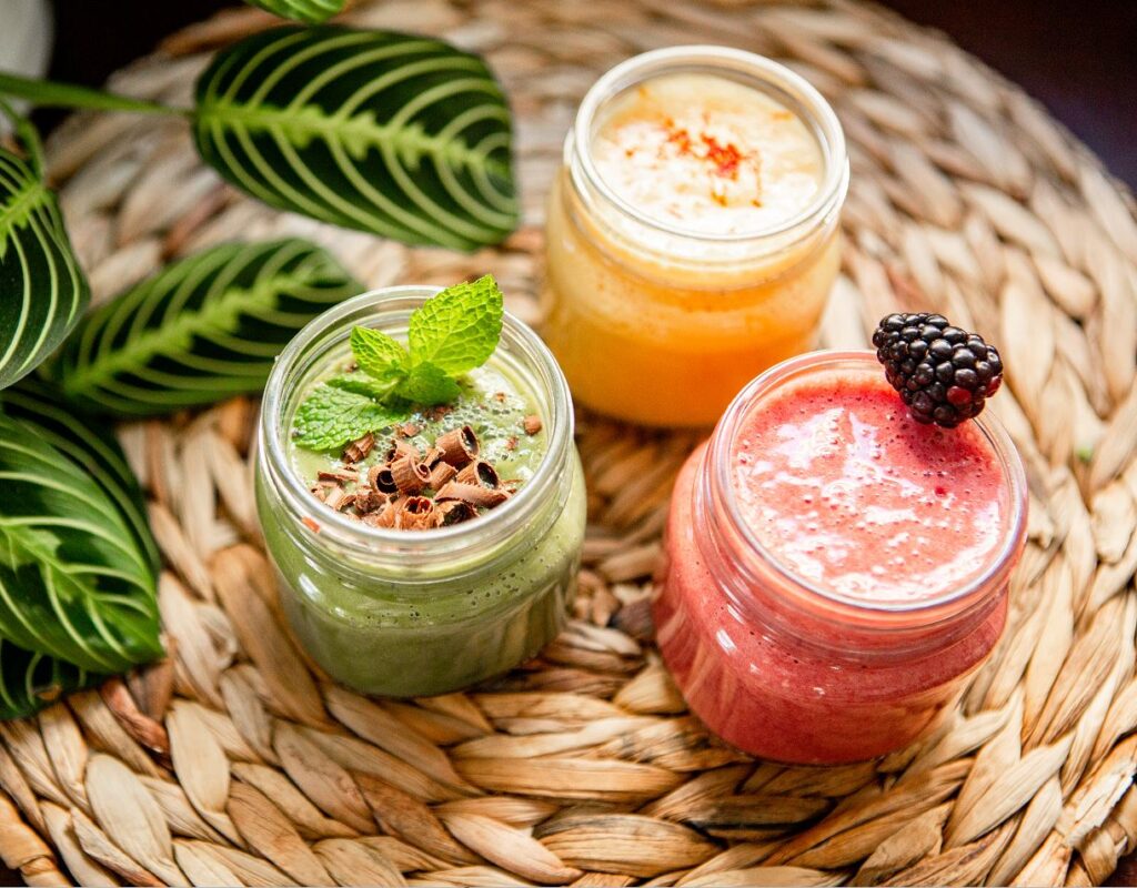 Green Mint, Pink Berry, and Orange Golden Road Smoothies