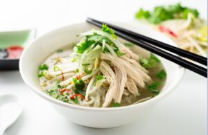 Chicken Pho Topped with Sprouts
