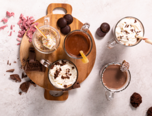 Hot Chocolate Options Top Down with Sprinkles, Candy Cane, Other Toppings