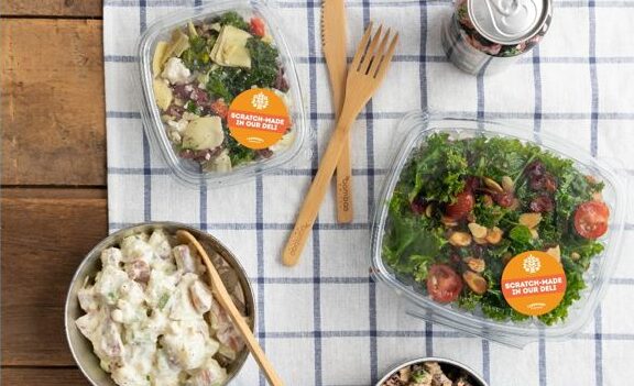 Santorini, Potato, and Greens Salad on a Picnic Table