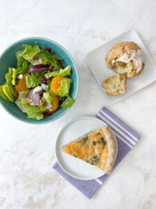 Quiche, Scone, and Salad on a Table