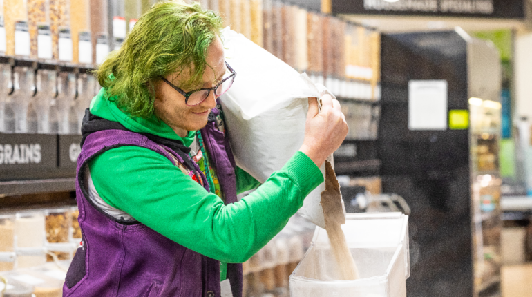 Employee Joker Pours Flour Into Bulk Bin