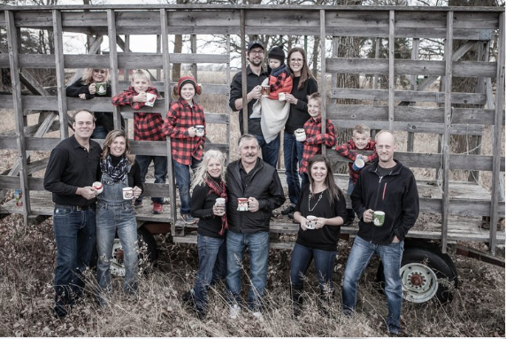 Brakstad Family Standing Together On Farm