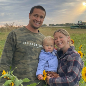 Mother, Father, And Child In Field