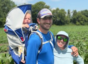 Farmer Becca and Family Smiling at Camera