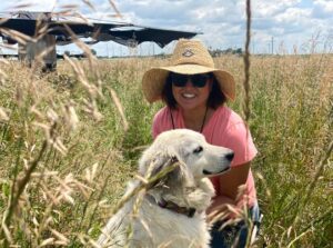 Farmer Wendy Pets Her White Farm Dog