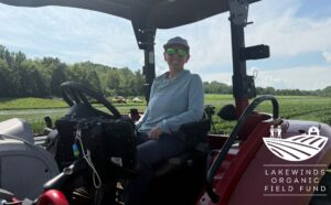 Farmer Becca Sits On Her Tractor That Has a New GPS System