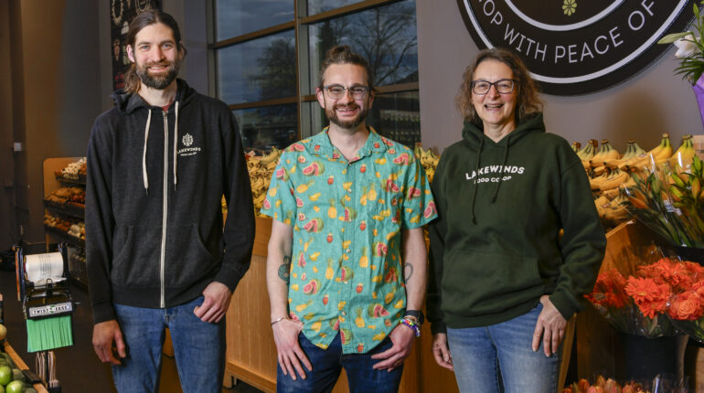 Three Lakewinds Produce Staff Standing Together