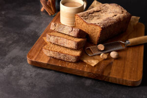 Sliced Apple Cider Loaf Cake on a Cutting Board